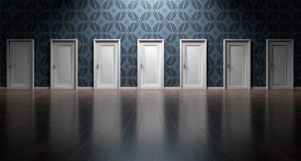 Open doors representing tax residency for entrepreneurs choosing between Singapore, Hong Kong, Dubai, Malta, and Portugal