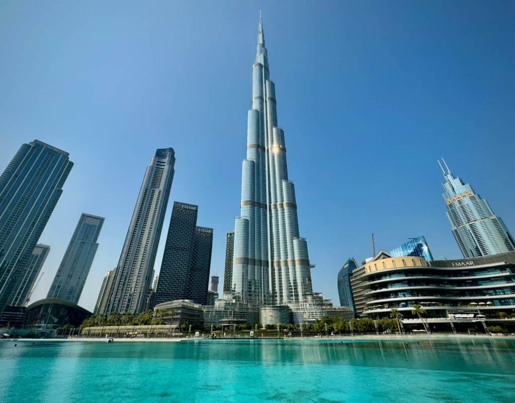 Dubai skyline with Burj Khalifa at sunset illustrating company formation and director residency rules"