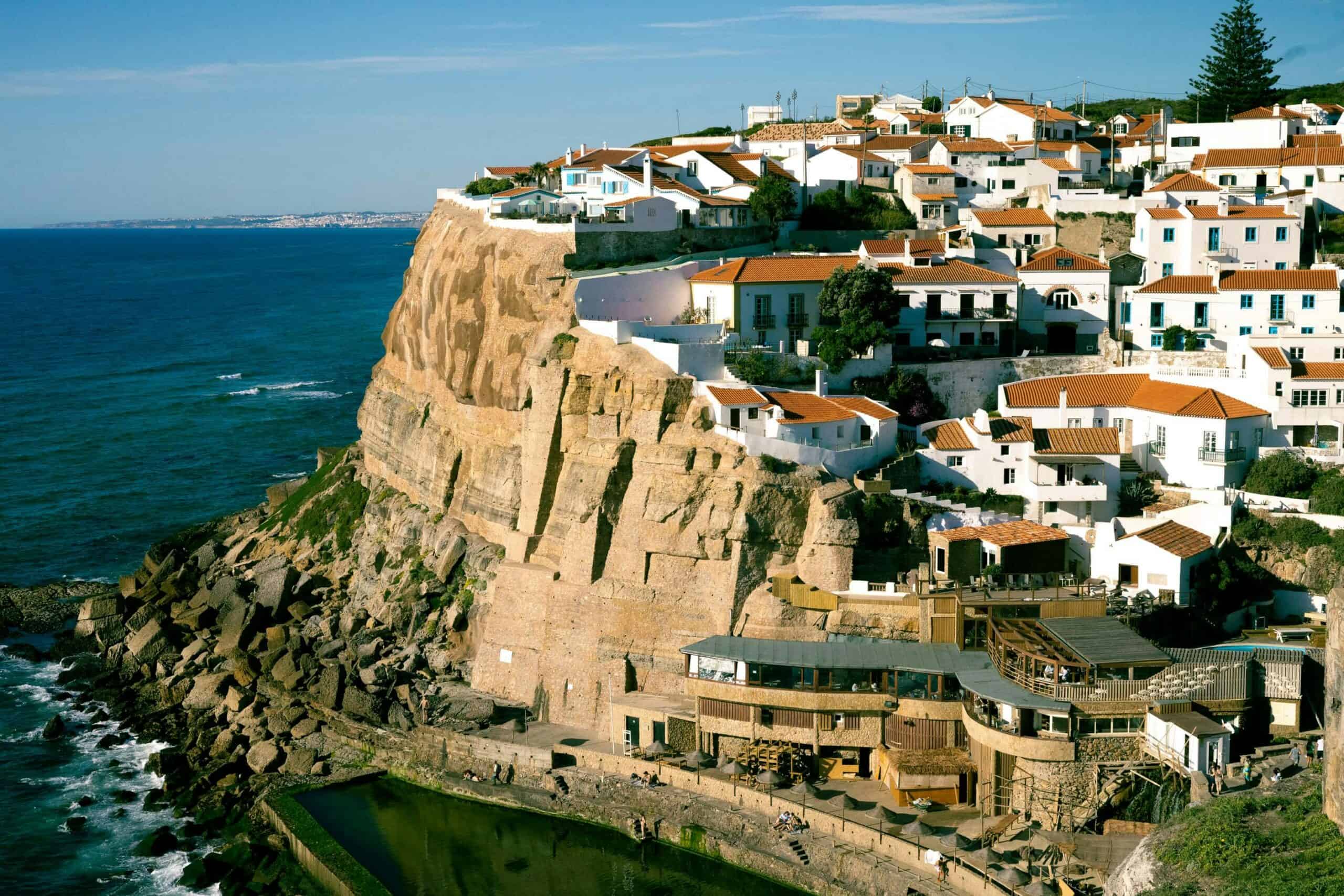 Azenhas do Mar cliffside village in Portugal, illustrating the Portugal NHR regime 2026