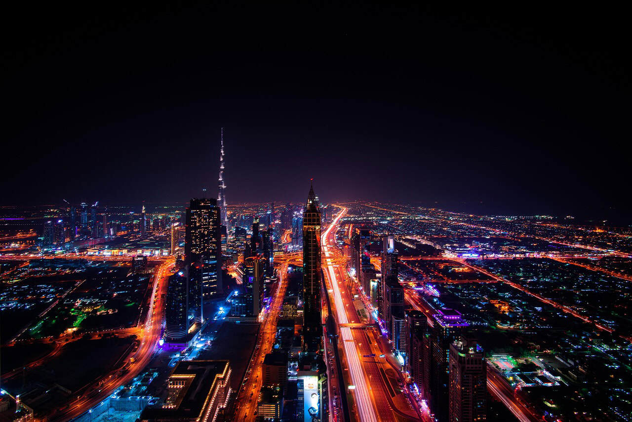 Dubai skyline at night reflecting the reality of opening a Dubai bank account for non-residents