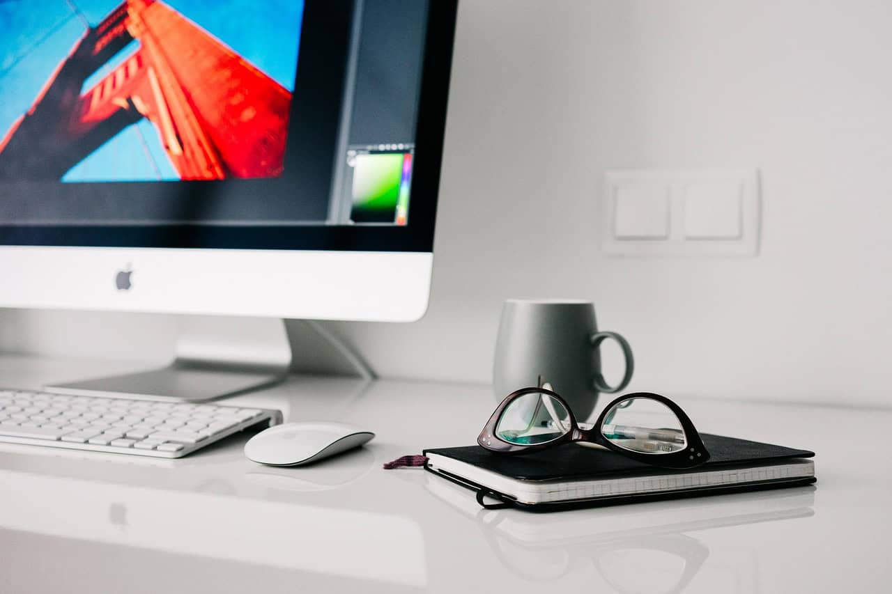 Home office desk setup triggering the 50% working time safe harbor threshold