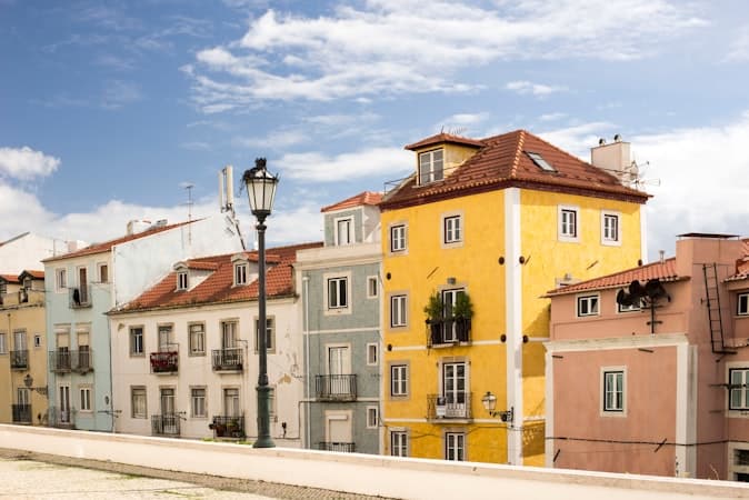 Renovated Lisbon street illustrating Portugal NHR vs regular tax residency changes in 2026