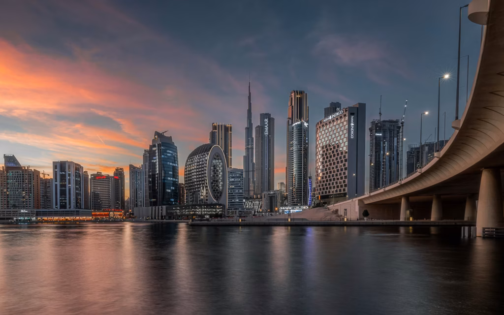 UAE corporate tax free zone skyline Dubai at dusk