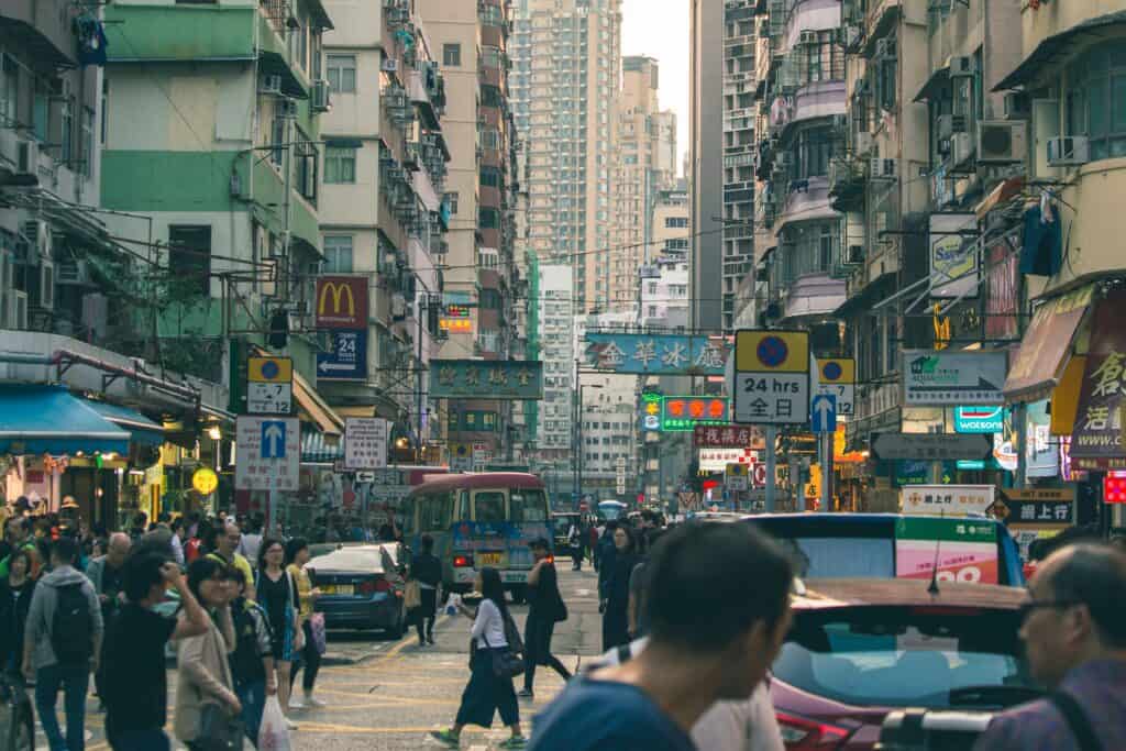 Busy Hong Kong street with shops and signage where foreign founders incorporate a private limited company