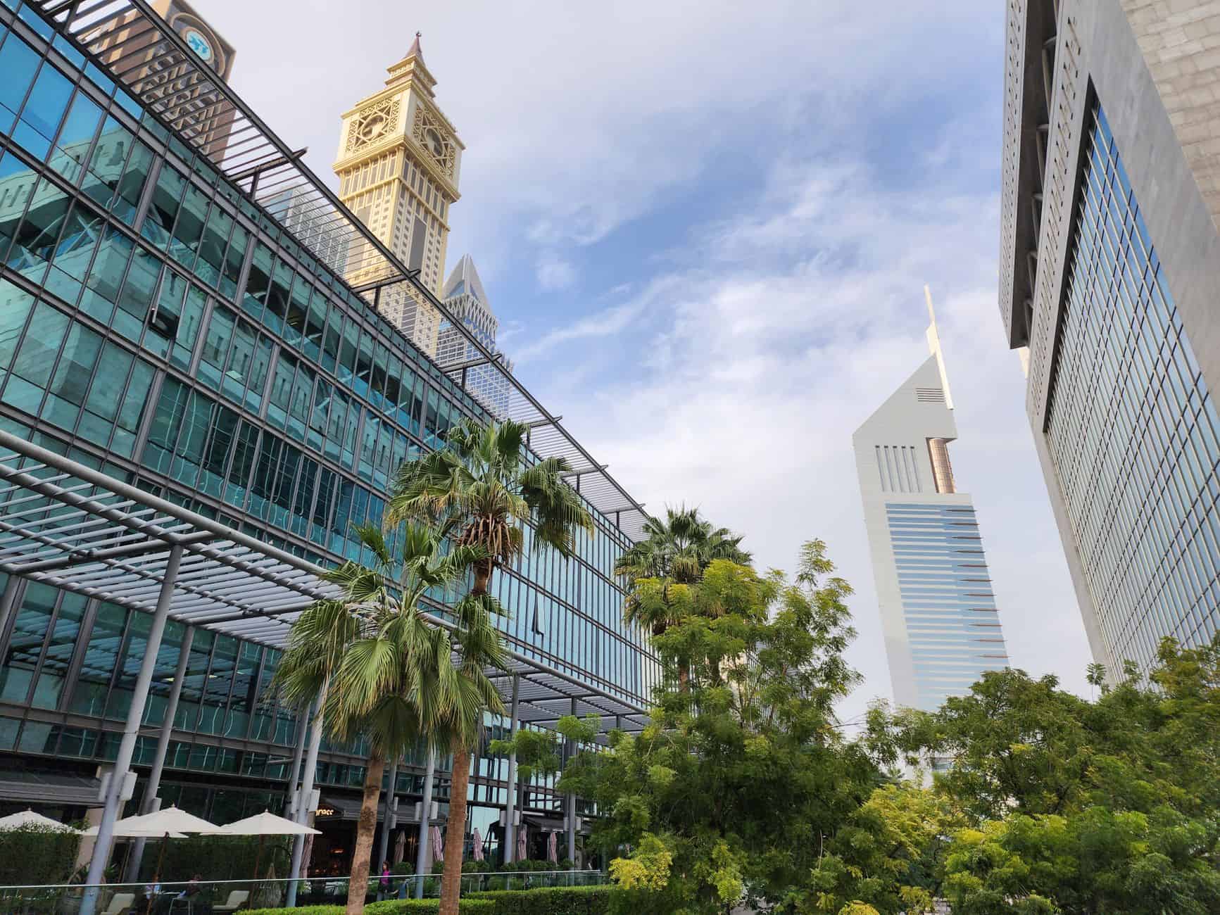 Dubai modern skyline with skyscrapers and palm trees reflecting business opportunities