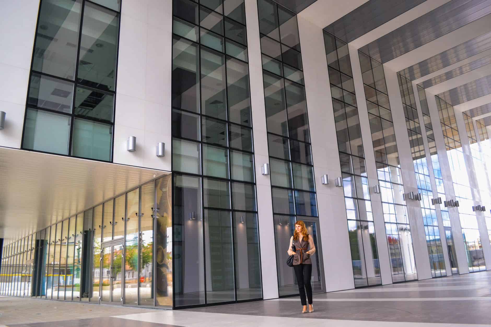 Professional in glass lobby navigating compliance steps for China trust reporting obligations