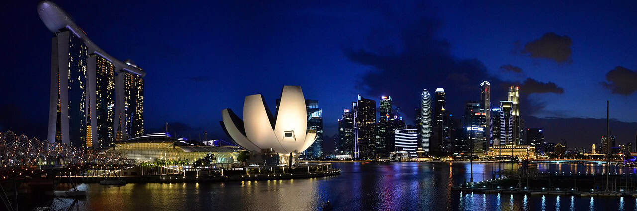 Singapore city skyline illustrating options to liquidate Singapore company through striking off or winding up