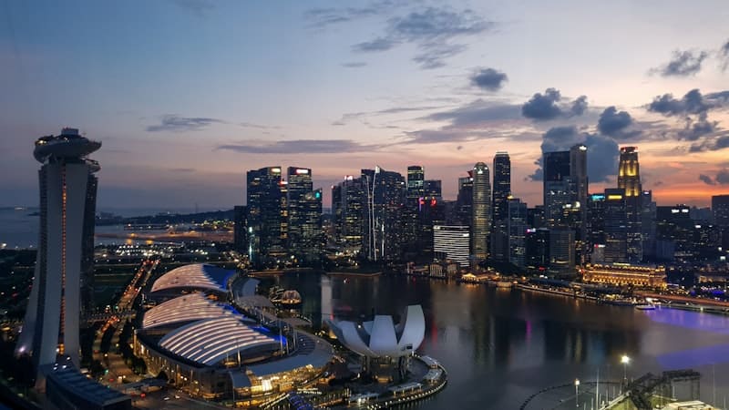 Marina Bay Sands at sunset representing full operational independence for foreign-owned entities