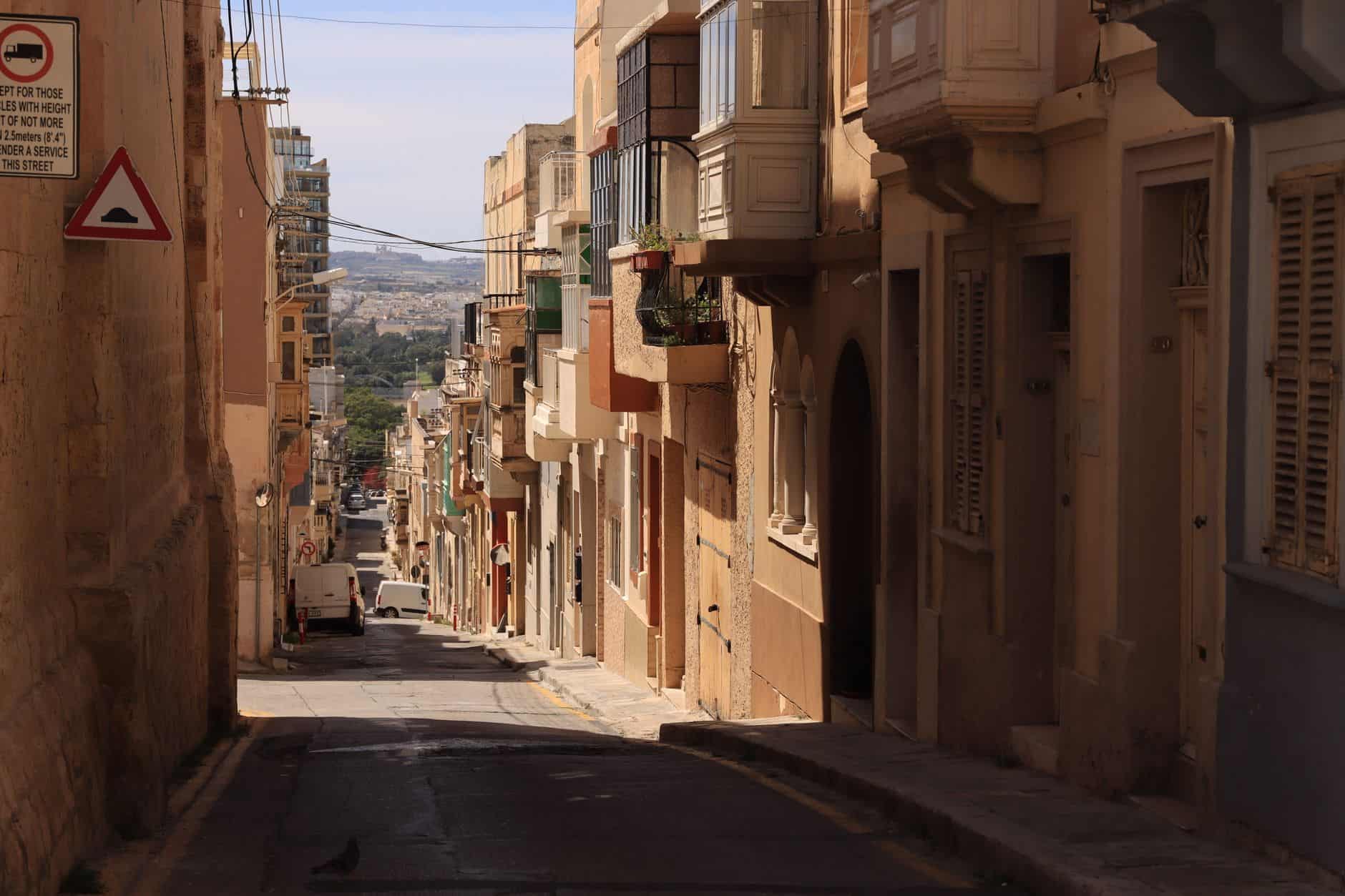 Narrow historic Valletta street where entrepreneurs build teams under Maltese employment law