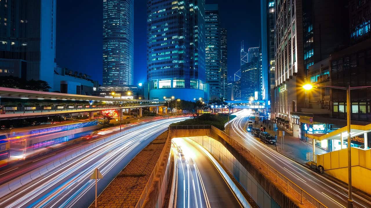 Hong Kong city skyline at night above the region's business banking district