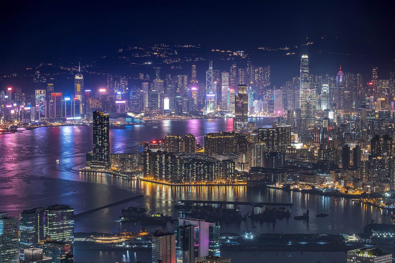 Hong Kong harbor skyline where cross-border insurance policies face new Chinese tax enforcement