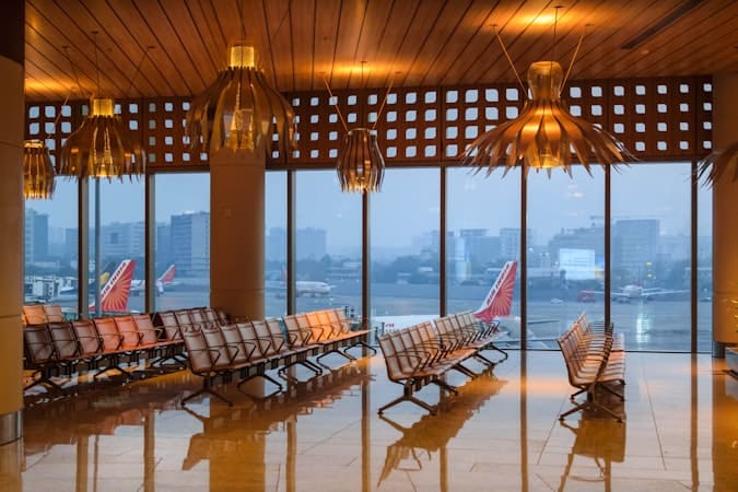 Mumbai airport waiting area showing overseas ties relevant to the sufficient ties test