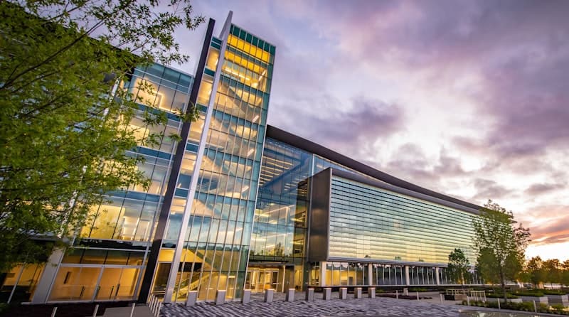 Global headquarters building representing what Revolut Business for international entrepreneurs offers worldwide