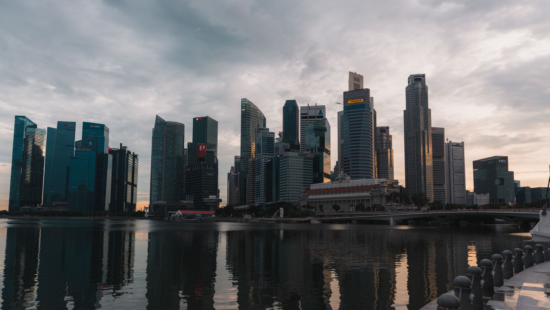Singapore company compliance calendar overview with glowing downtown skyline at dusk