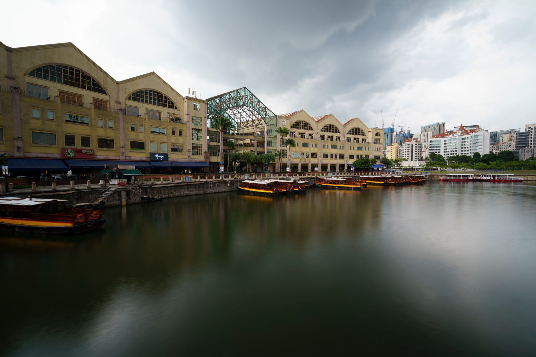 IRAS tax filing deadlines reflected in a vibrant Singapore riverside business district