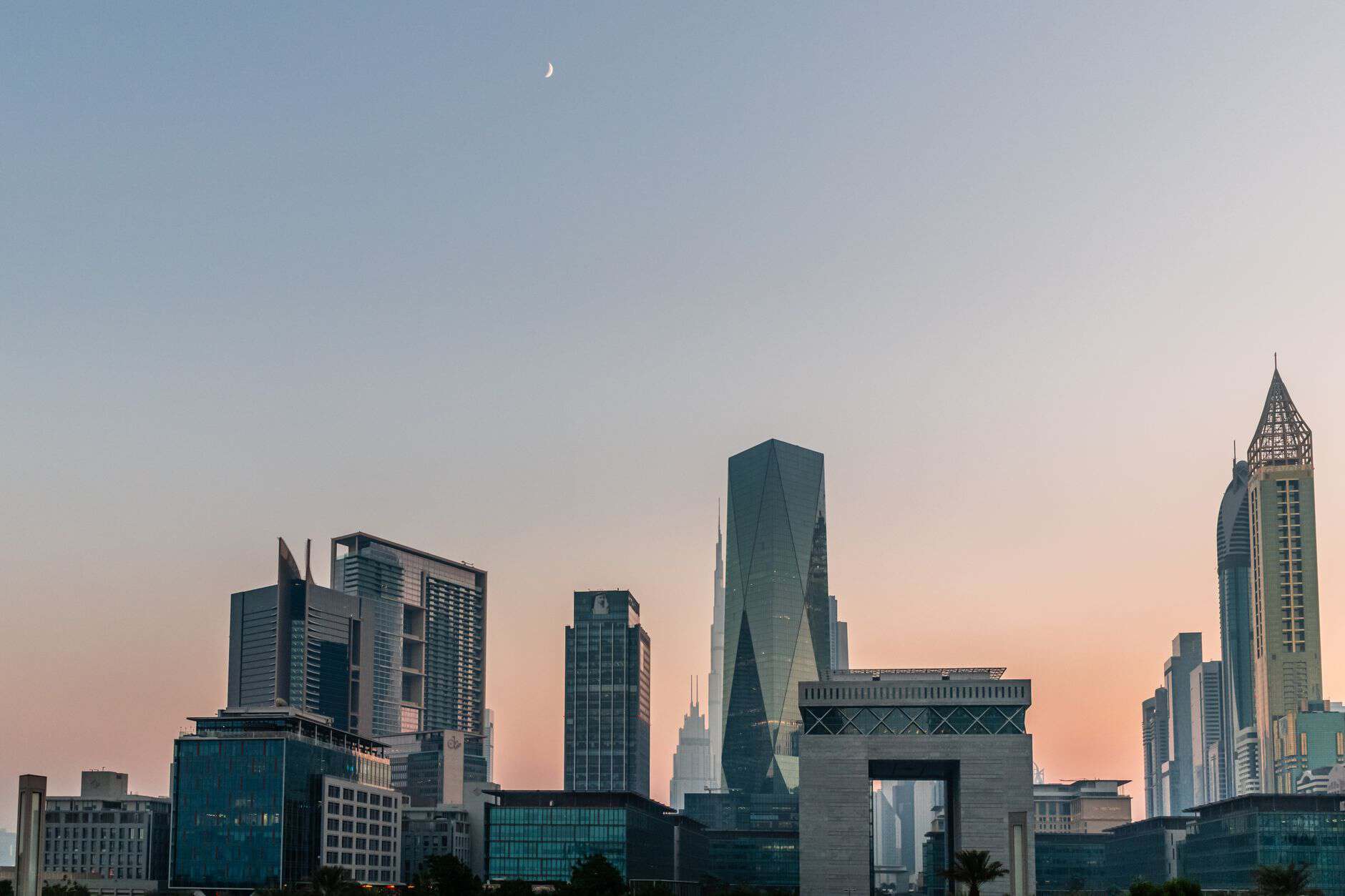 Dubai skyline at sunset reflecting age-based payroll contribution rules for small teams