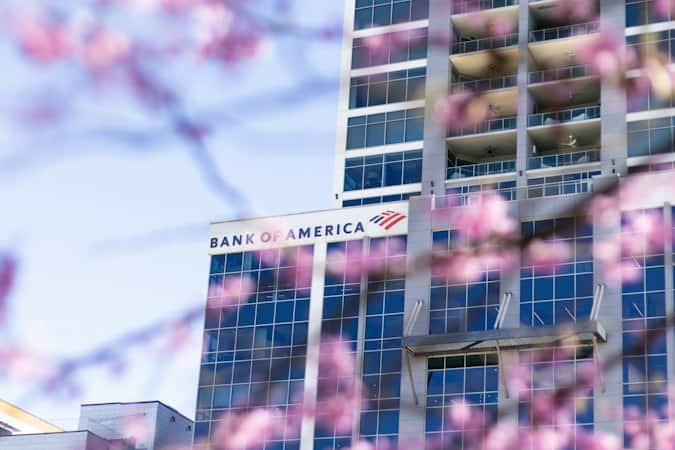 Modern bank headquarters facade representing multi currency invoicing for international service businesses
