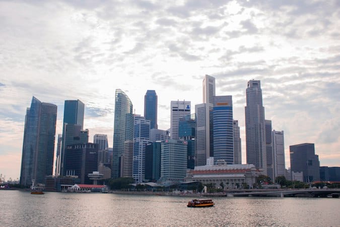 White high-rise building representing Singapore company bank account closure from dormancy policies