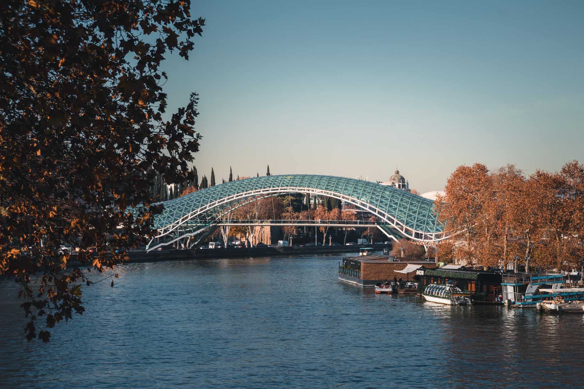 Tbilisi Peace Bridge symbolizing connectivity for entrepreneurs optimizing global tax structures