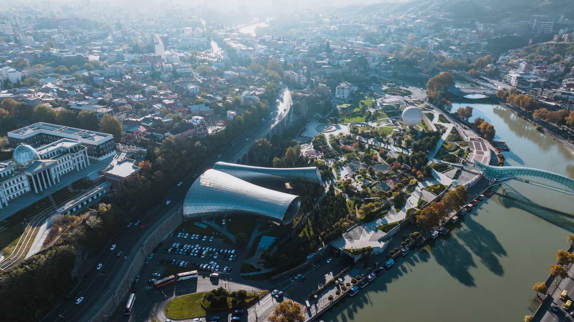 Modern Tbilisi architecture and green landscapes ideal for executing your 90-day founder action plan