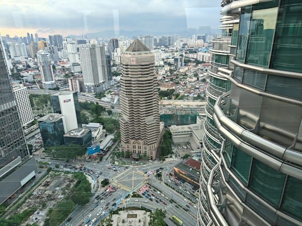 Modern Kuala Lumpur cityscape representing Malaysia's diverse and skilled international workforce