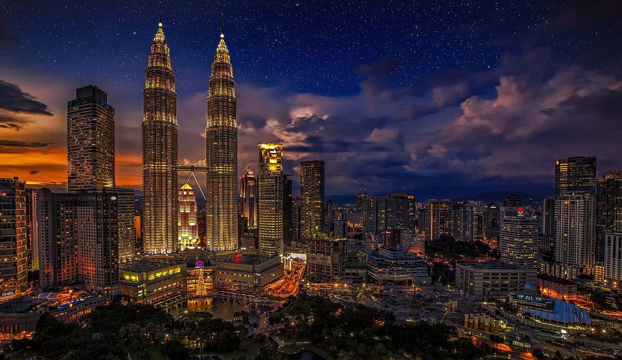Petronas Twin Towers at night symbolizing Malaysia's thriving venture capital ecosystem