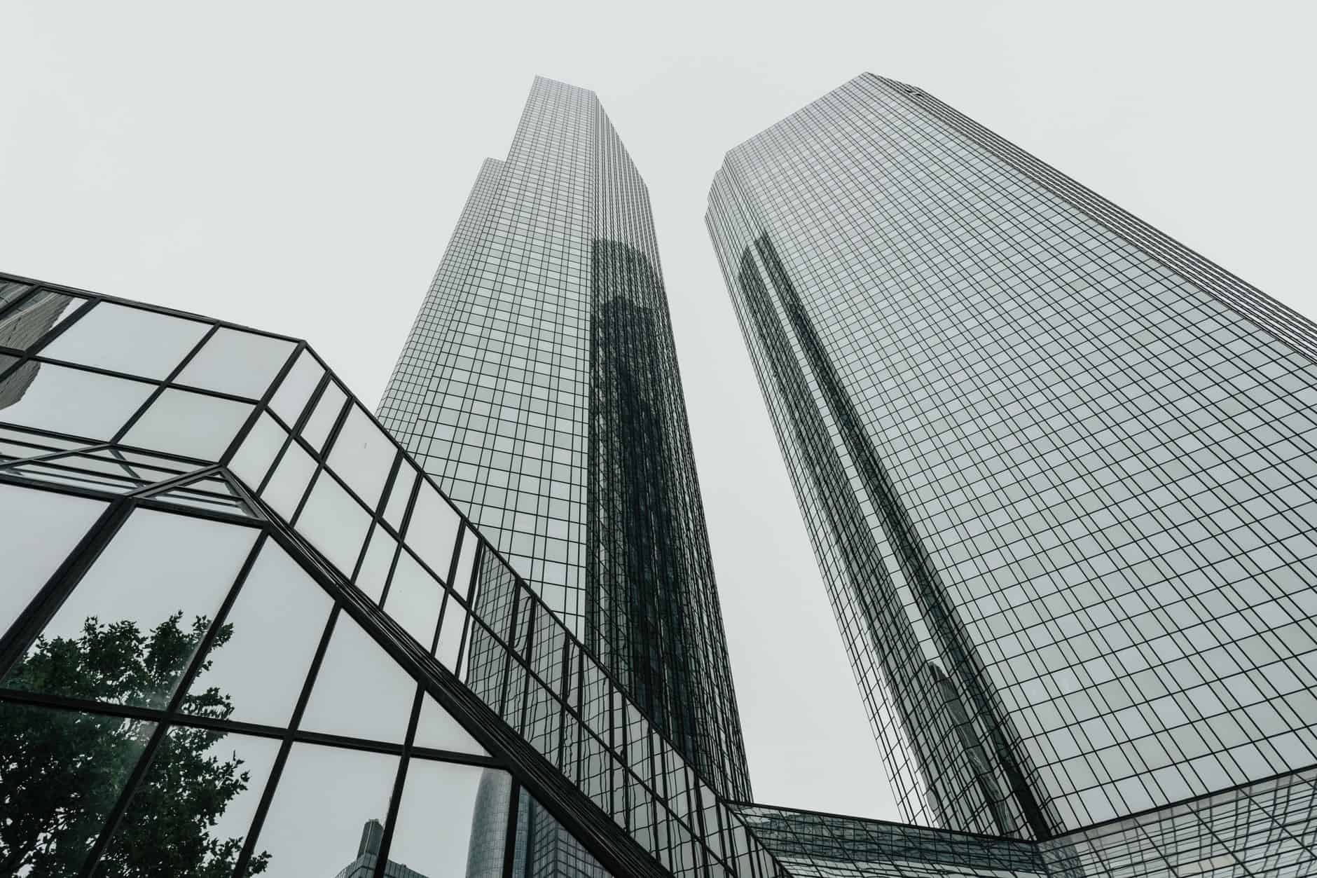 Glass skyscrapers representing key legal and institutional contacts for entrepreneurs establishing operations