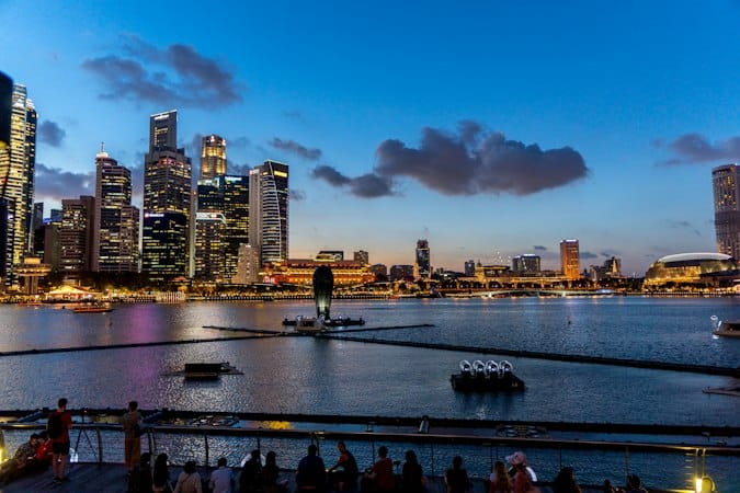 S Pass vs Employment Pass key differences illustrated by Singapore's Central Business District skyline